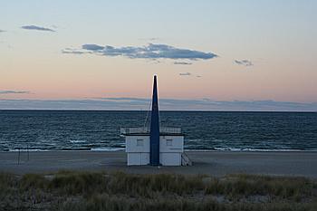 Yachtcharter Segeln Deutschland - Sonnenuntergang am Warnemünder Strand